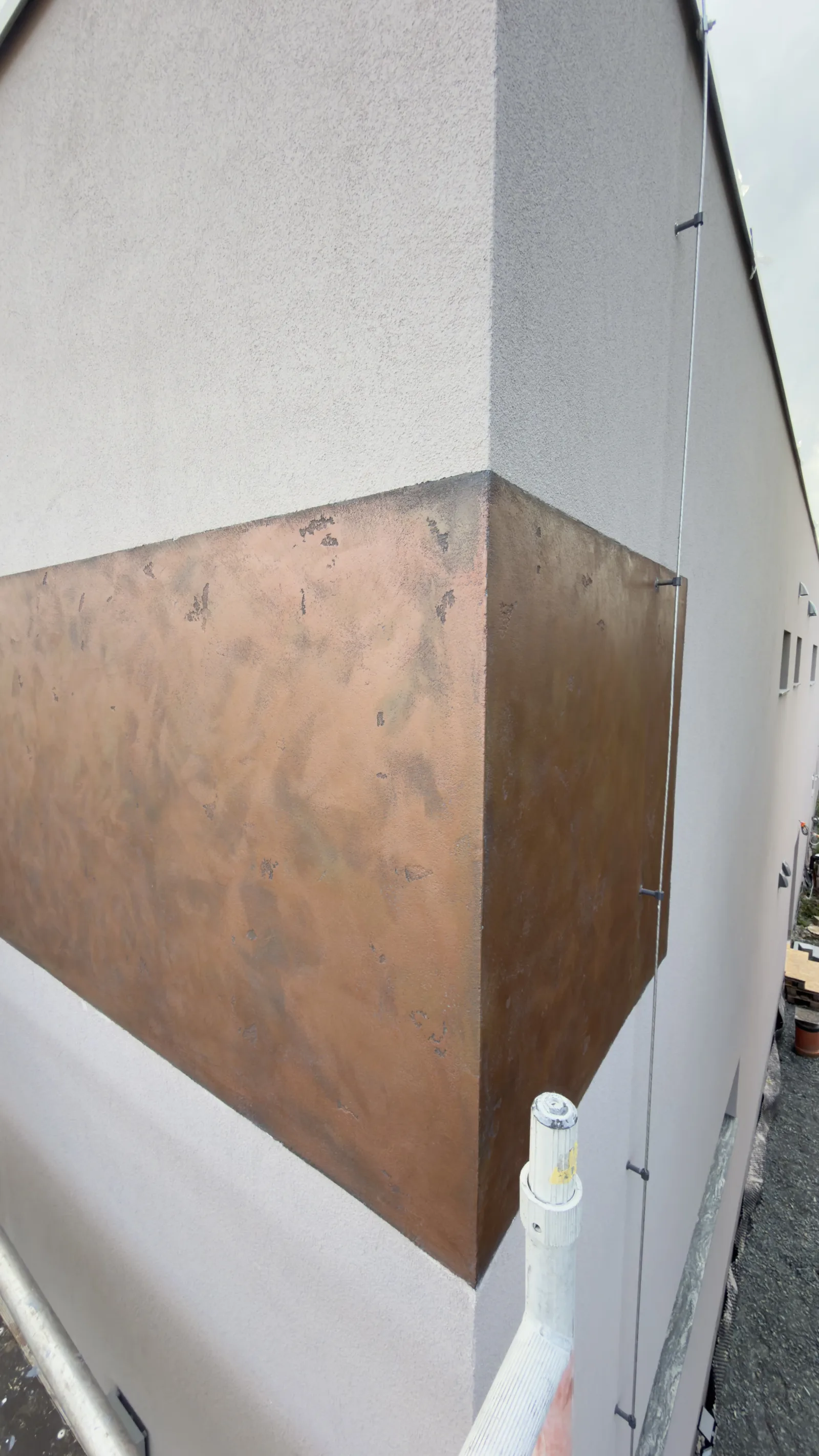 Detail zakončení exteriérové stěrky na rohu domu